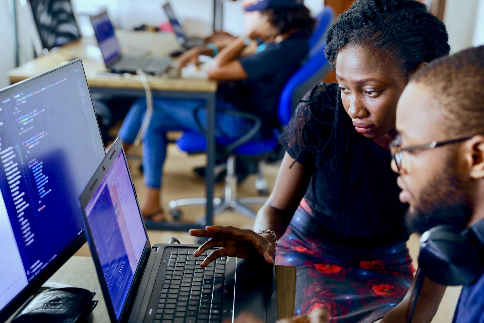 African software developer coding, illustrating open-source and SaaS licensing risk for Kenyan tech startups