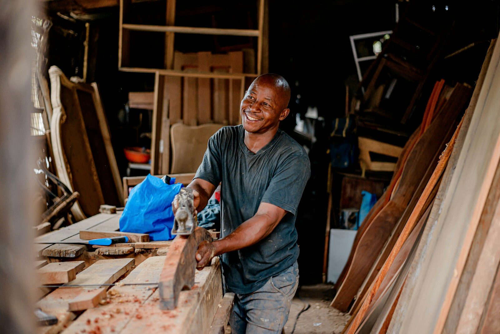 African family-owned small business craftsman at work