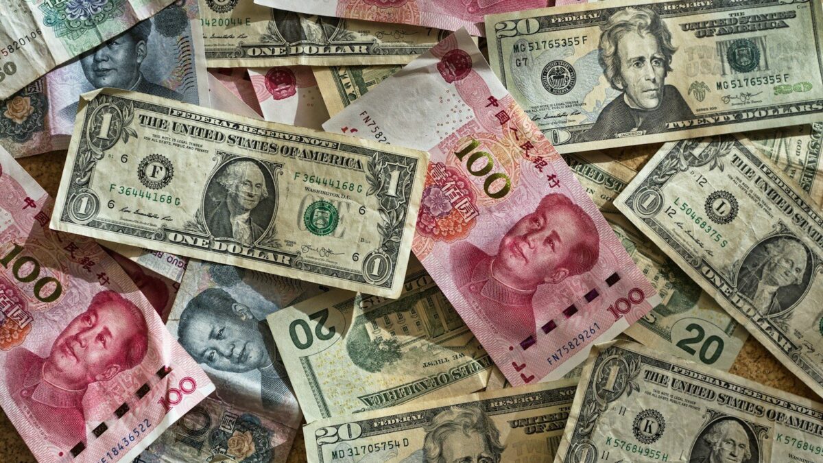 Assorted currency banknotes, representing cross-border royalty payments and withholding tax on IP licences from Kenya