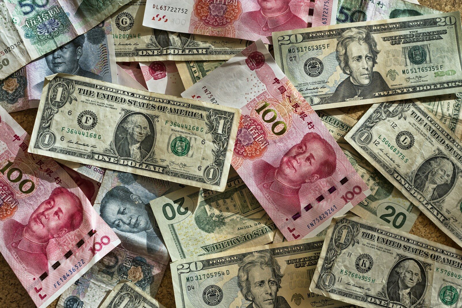 Assorted currency banknotes, representing cross-border royalty payments and withholding tax on IP licences from Kenya