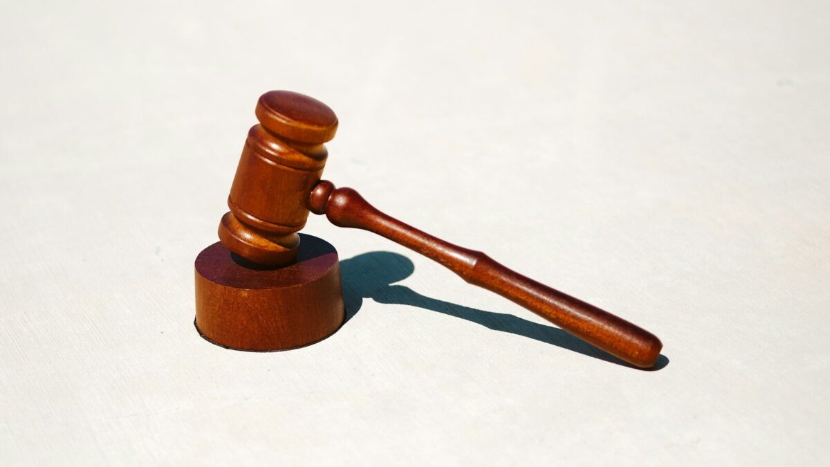 A wooden gavel, representing enforcement of a foreign judgment or arbitral award over IP rights in a Kenyan court