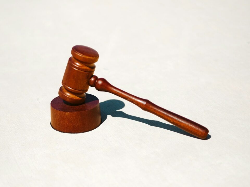 A wooden gavel, representing enforcement of a foreign judgment or arbitral award over IP rights in a Kenyan court