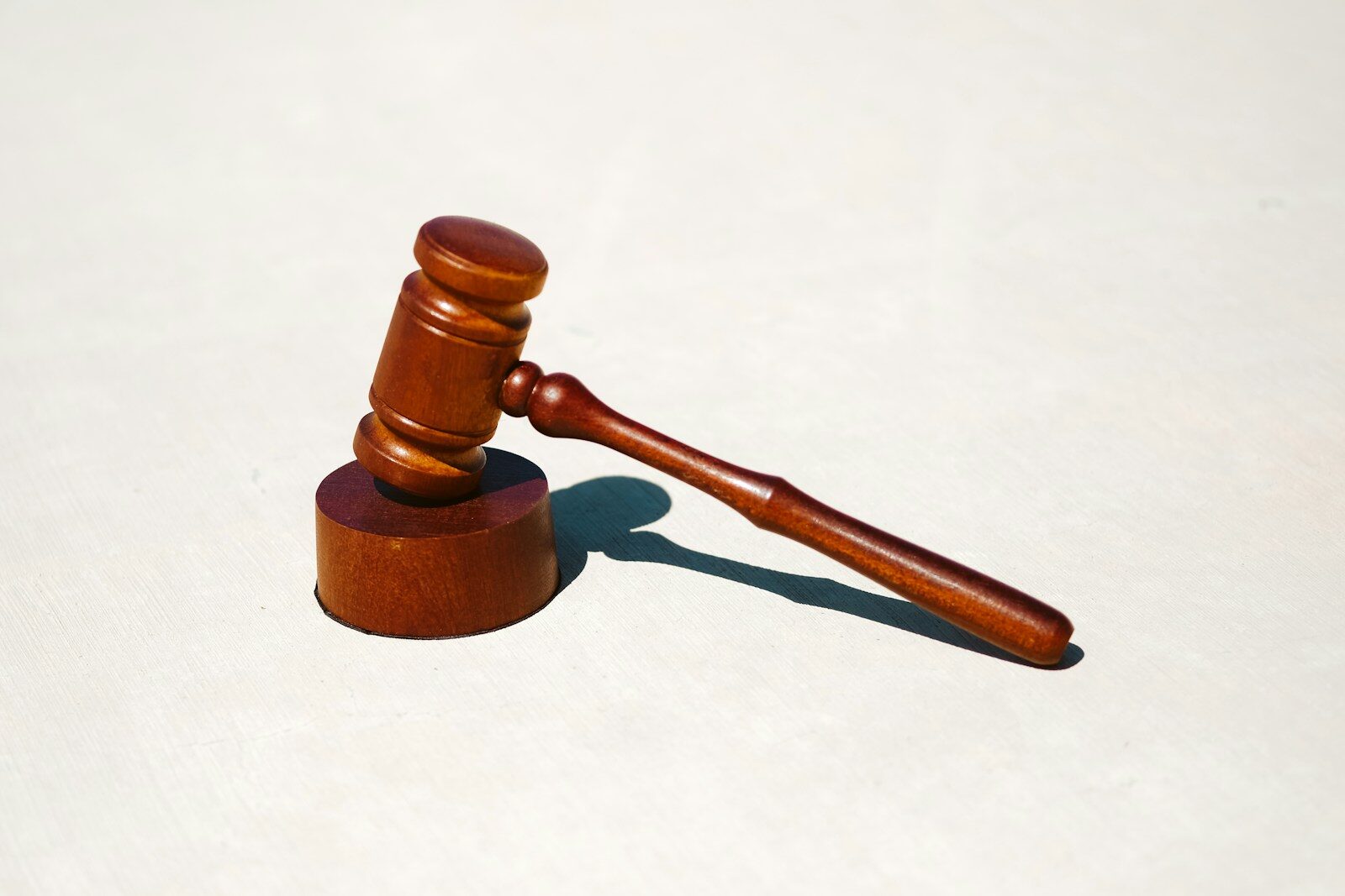 A wooden gavel, illustrating enforcing a foreign judgment in Kenya or a foreign arbitral award over IP rights