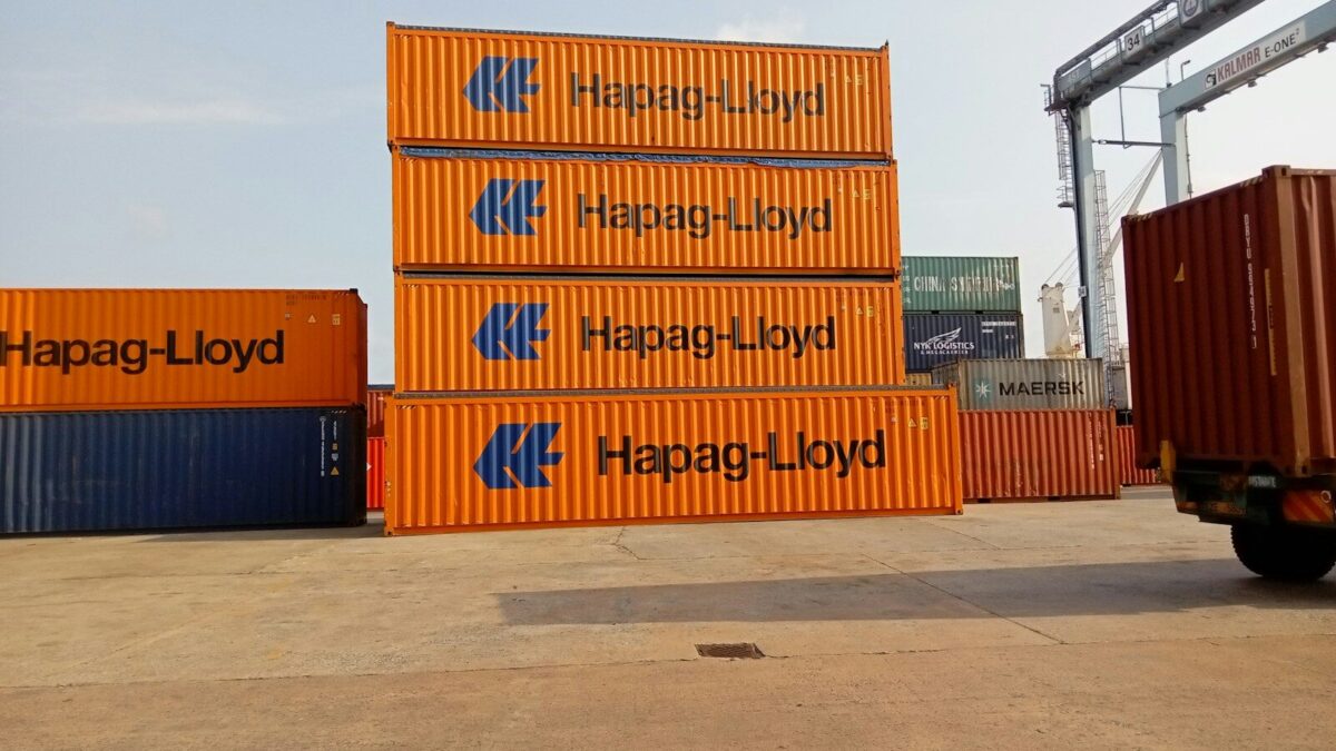 Shipping containers at a Kenyan port, illustrating customs recordation Kenya requires for imported trademarked goods