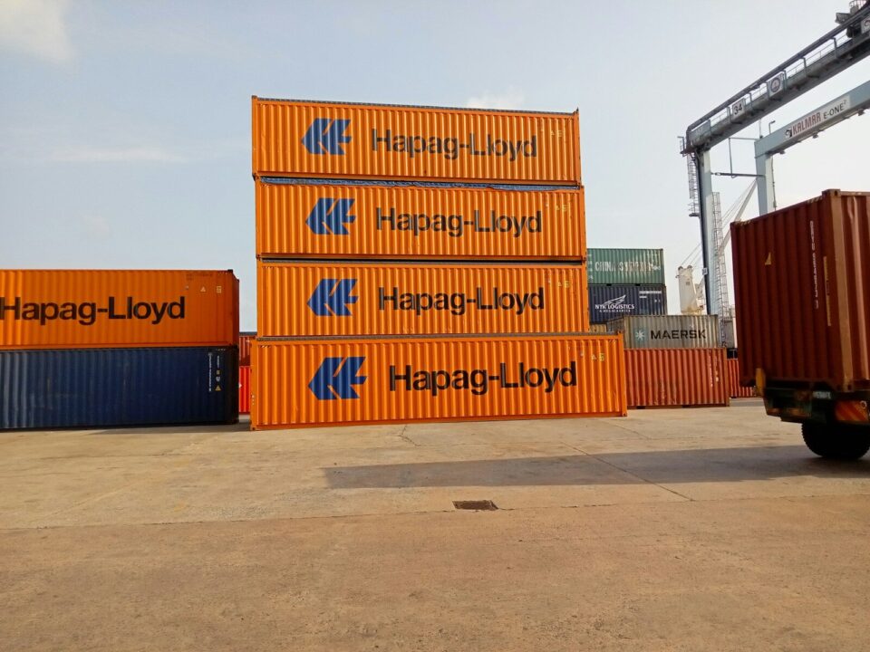 Shipping containers at a Kenyan port, illustrating customs recordation Kenya requires for imported trademarked goods