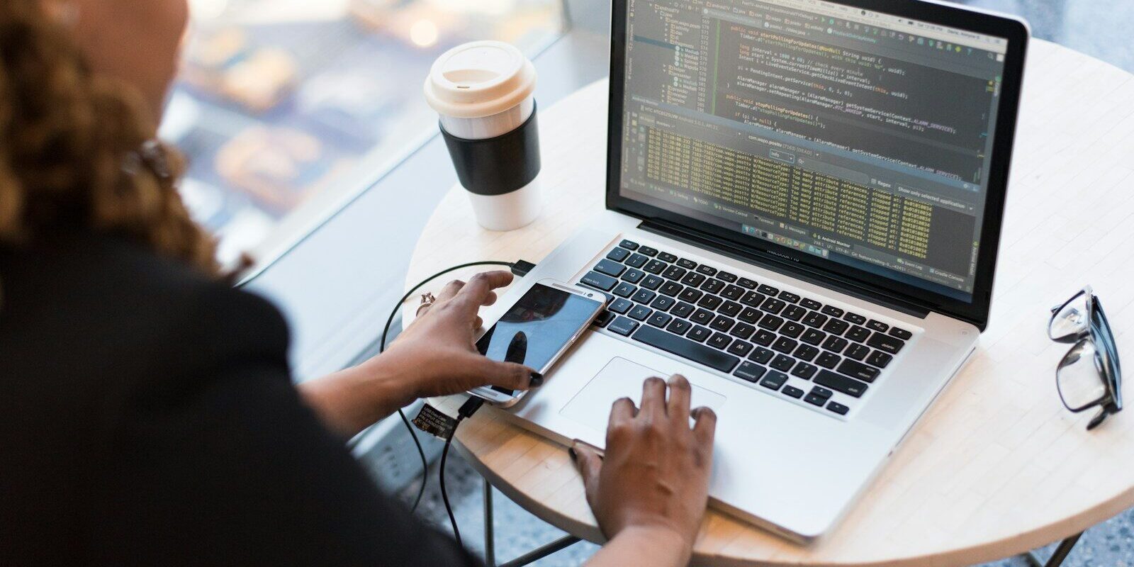 African software developer building a tokenisation platform on a laptop