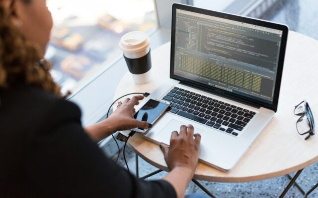 African software developer building a tokenisation platform on a laptop