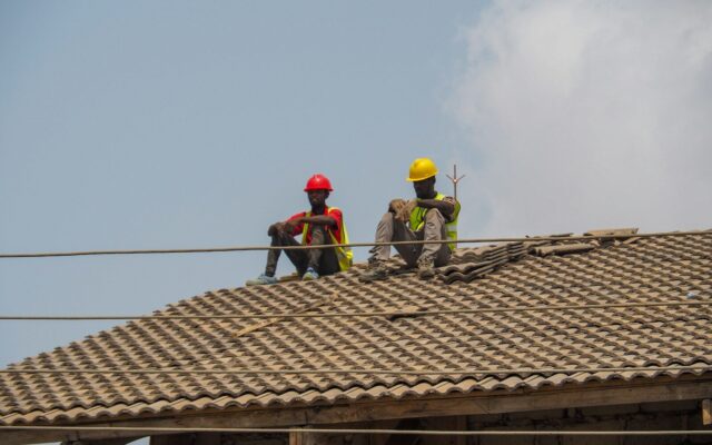 Registered contractors securing NCA approvals while working on a building site in Kenya