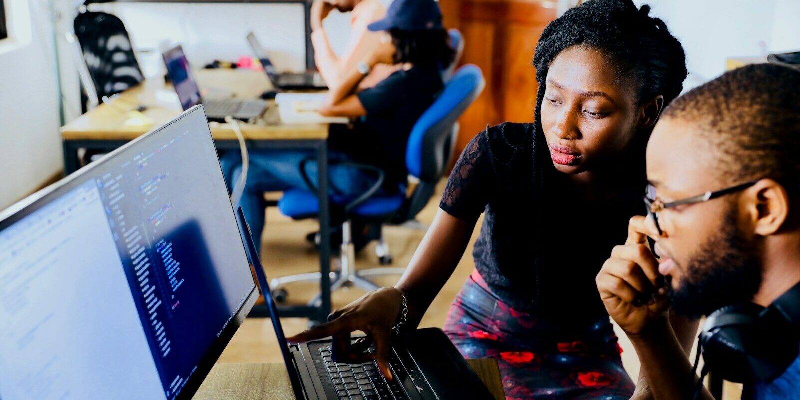 Virtual Asset Custody Obligations Kenya — African fintech professionals reviewing wallet reconciliation records on a laptop