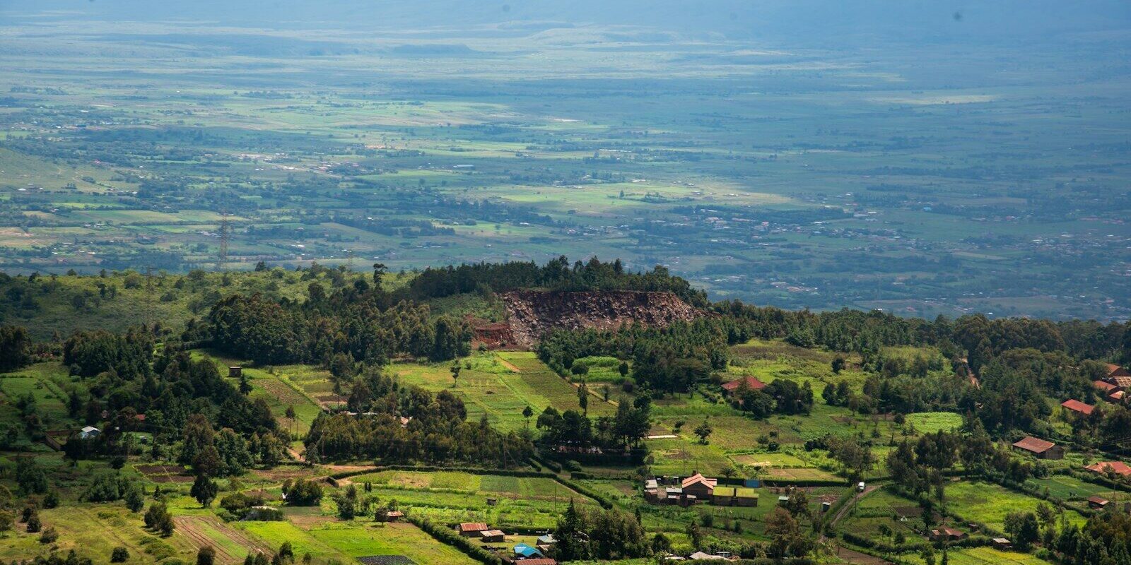 Land Control Board Consent Kenya — Aerial view of subdivided farmland plots in rural Kenya