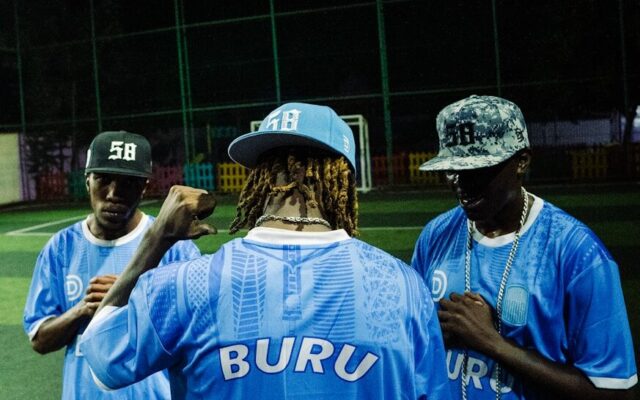 Players wearing club football jerseys, representing merchandising and sponsorship intellectual property for Kenyan sports clubs