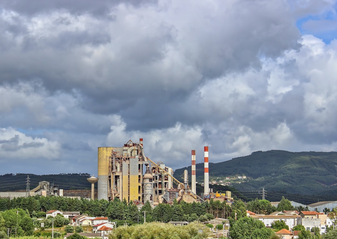 Cement manufacturing plant with processing towers