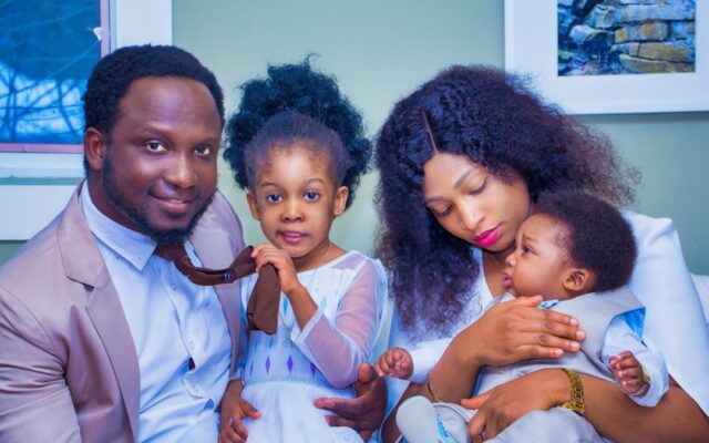 African family celebrating a new home purchase
