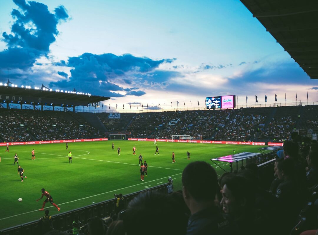 Football match underway at a stadium