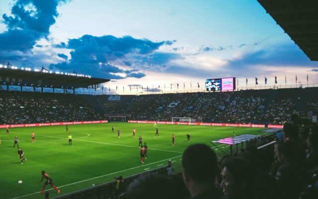 Football match underway at a stadium
