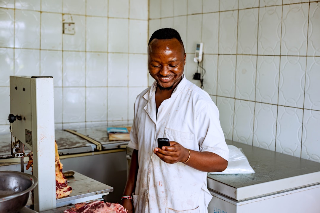 Kenyan meat processing worker in a plant