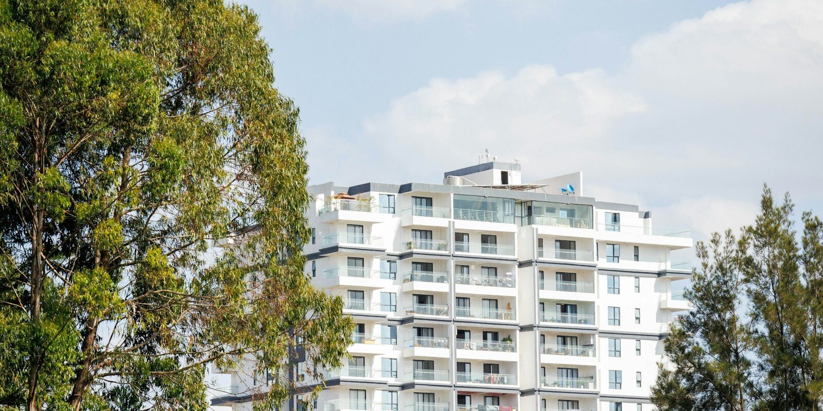 Non-resident rental income tax: a modern apartment block let to tenants in an East African city