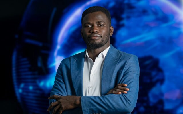 Freezing and seizure orders: an African technology professional in a blue blazer before a digital globe backdrop