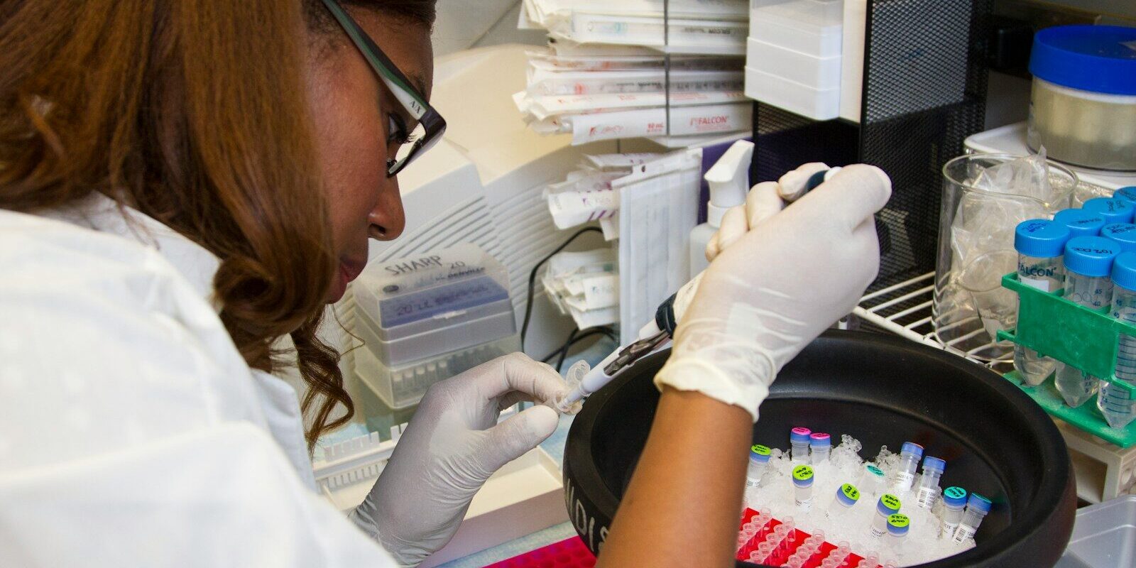 African researchers analyzing samples in a clinical trial laboratory in Kenya