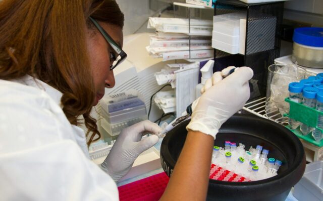 African researchers analyzing samples in a clinical trial laboratory in Kenya