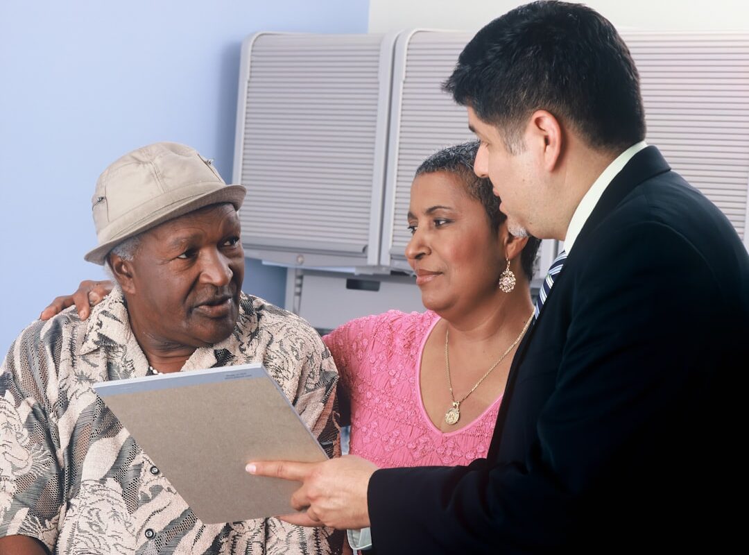 Business professionals discussing a property transaction agreement in Kenya