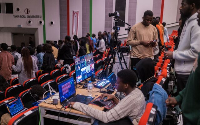 Esports players and laptops at a gaming competition representing esports jurisdiction in Kenya