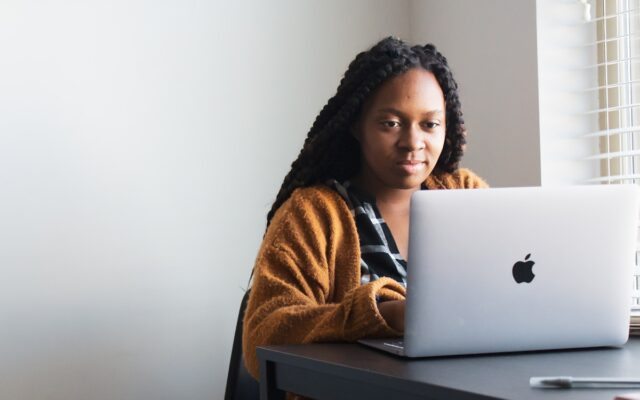 African professional working remotely on a laptop, representing a digital nomad applying for a Kenya Class N permit