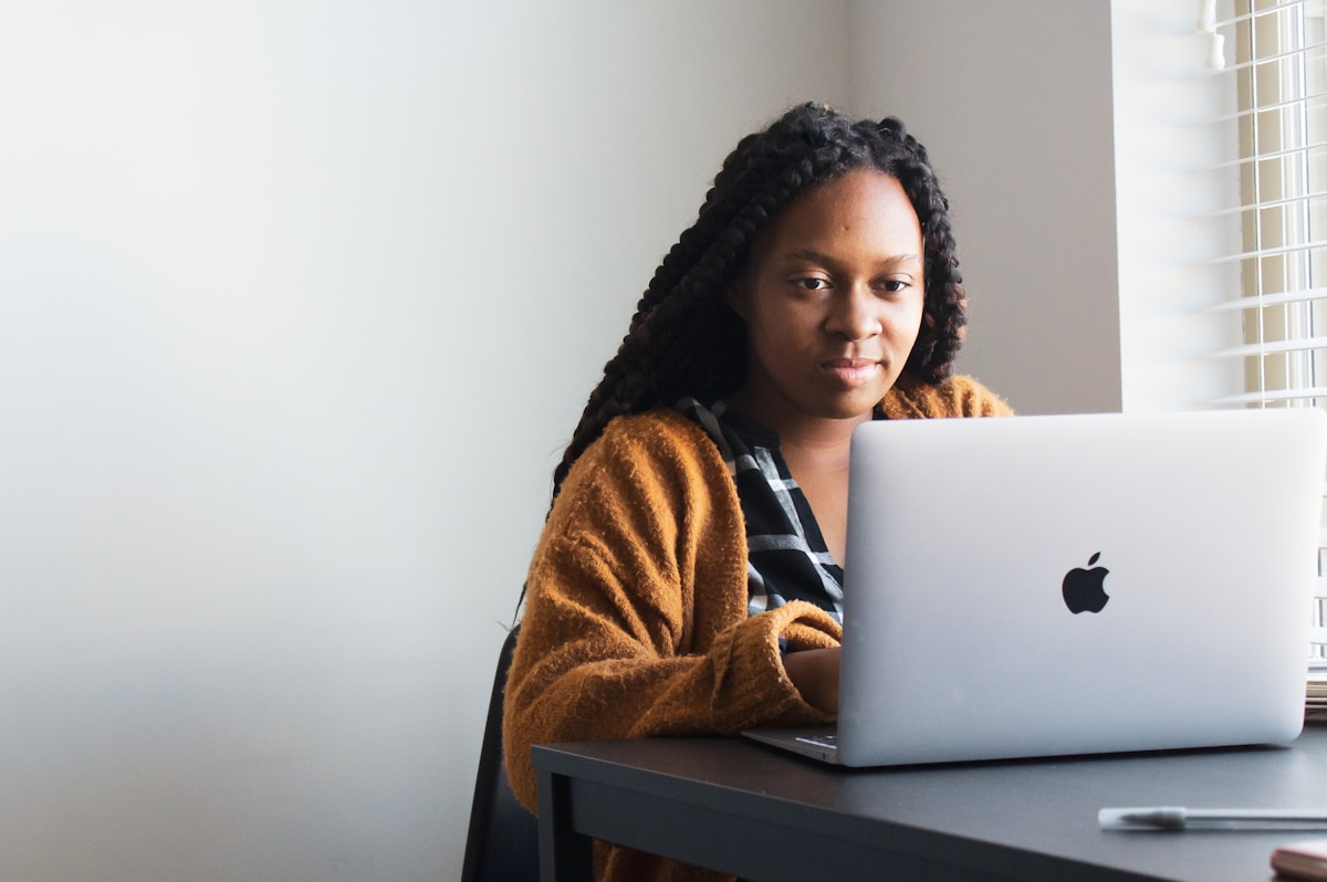 African professional working remotely on a laptop, representing a digital nomad applying for a Kenya Class N permit