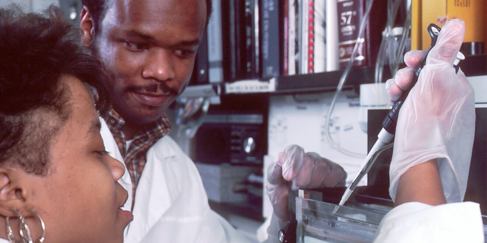 African laboratory technician conducting clinical trial sample testing in Kenya
