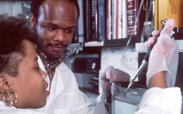 African laboratory technician conducting clinical trial sample testing in Kenya