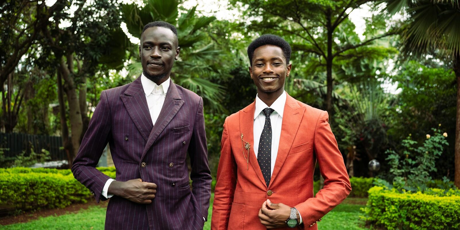 Two Kenyan business executives in suits, representing board composition choices for a foreign-owned company