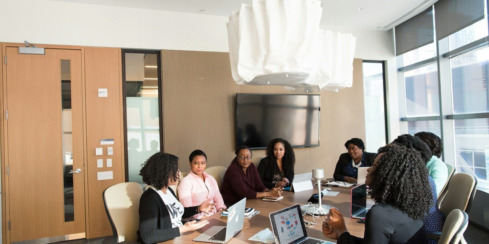 African legal team reviewing a cross-border licensing contract in a Nairobi office