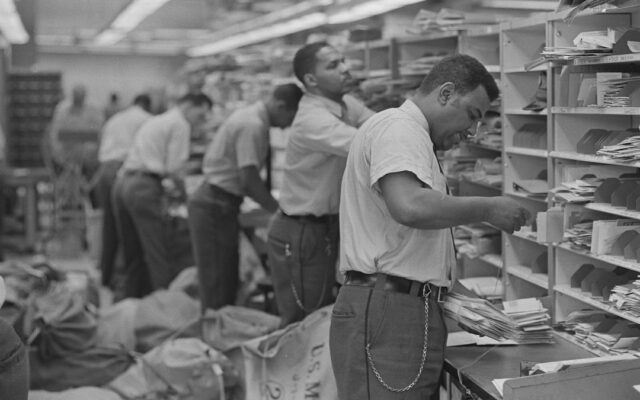 Workers in an industrial warehouse representing Special Economic Zone operations in Kenya