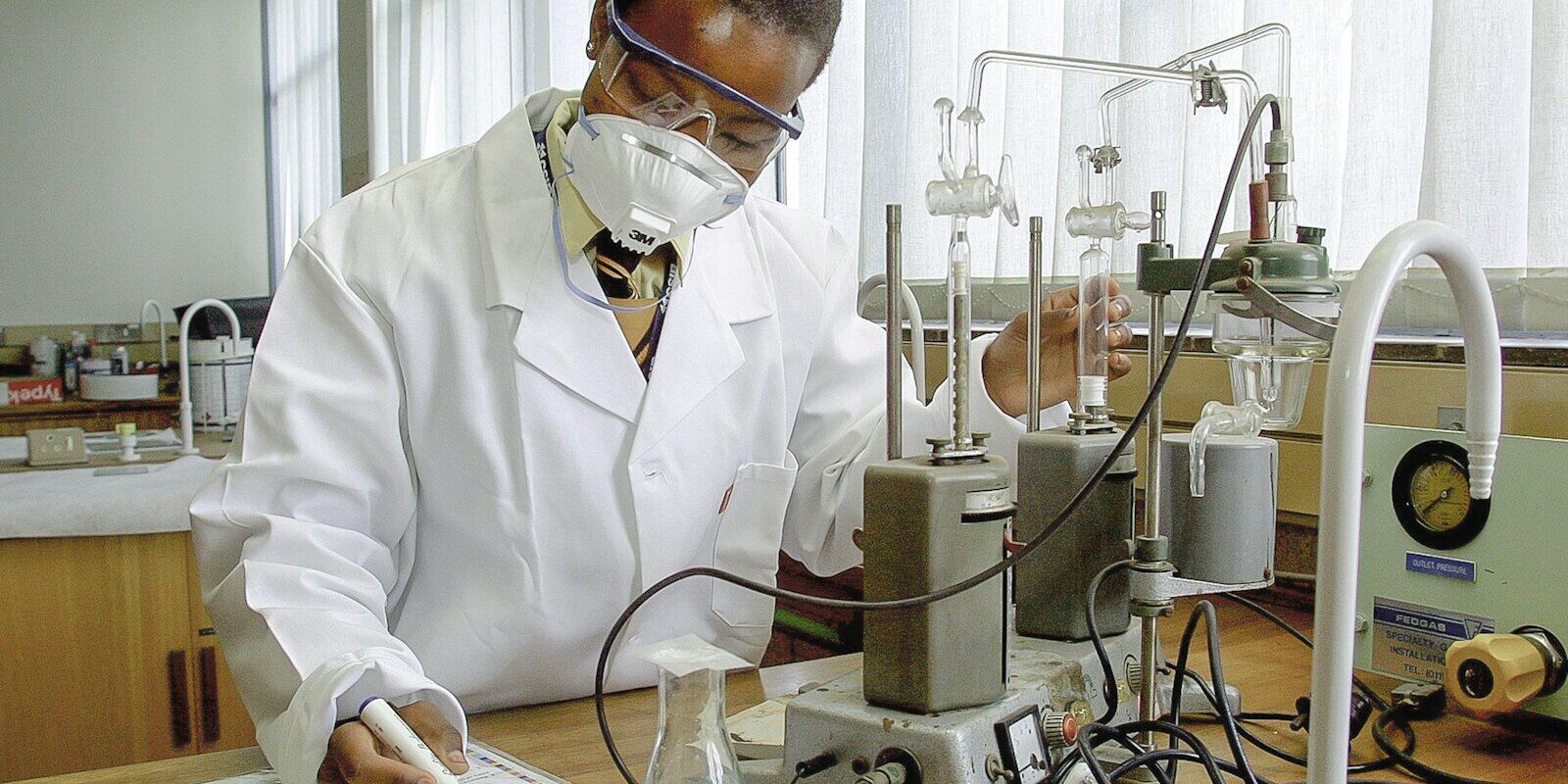 Laboratory scientist analyzing a sample for export from Kenya