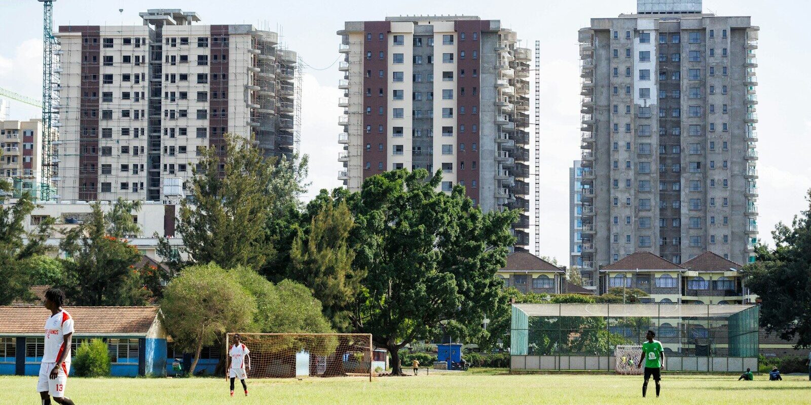 Modern residential apartment towers under construction in Nairobi, representing Kenya's Affordable Housing programme