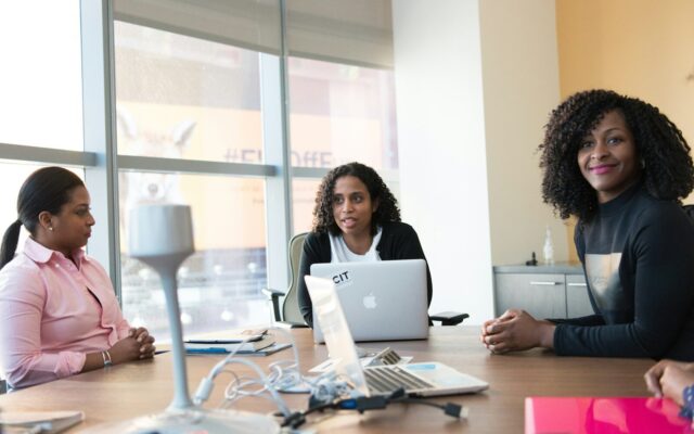 African businesswomen reviewing venture financing term sheet in Kenya office