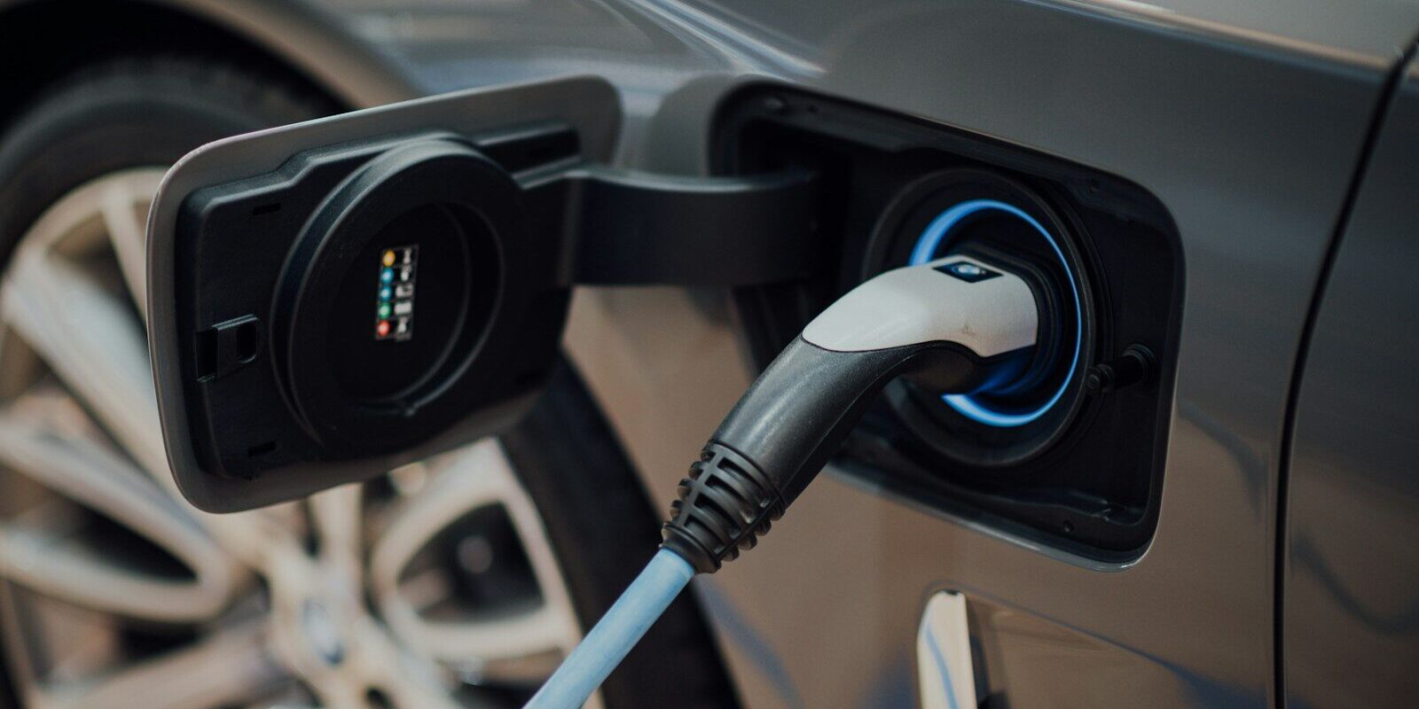 National Electric Mobility Policy: EV charging connector plugged into a car in Kenya